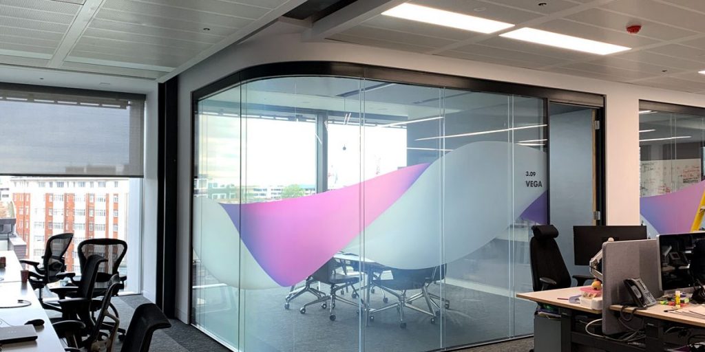Finastra Office Space with Curved Glass Smart Film